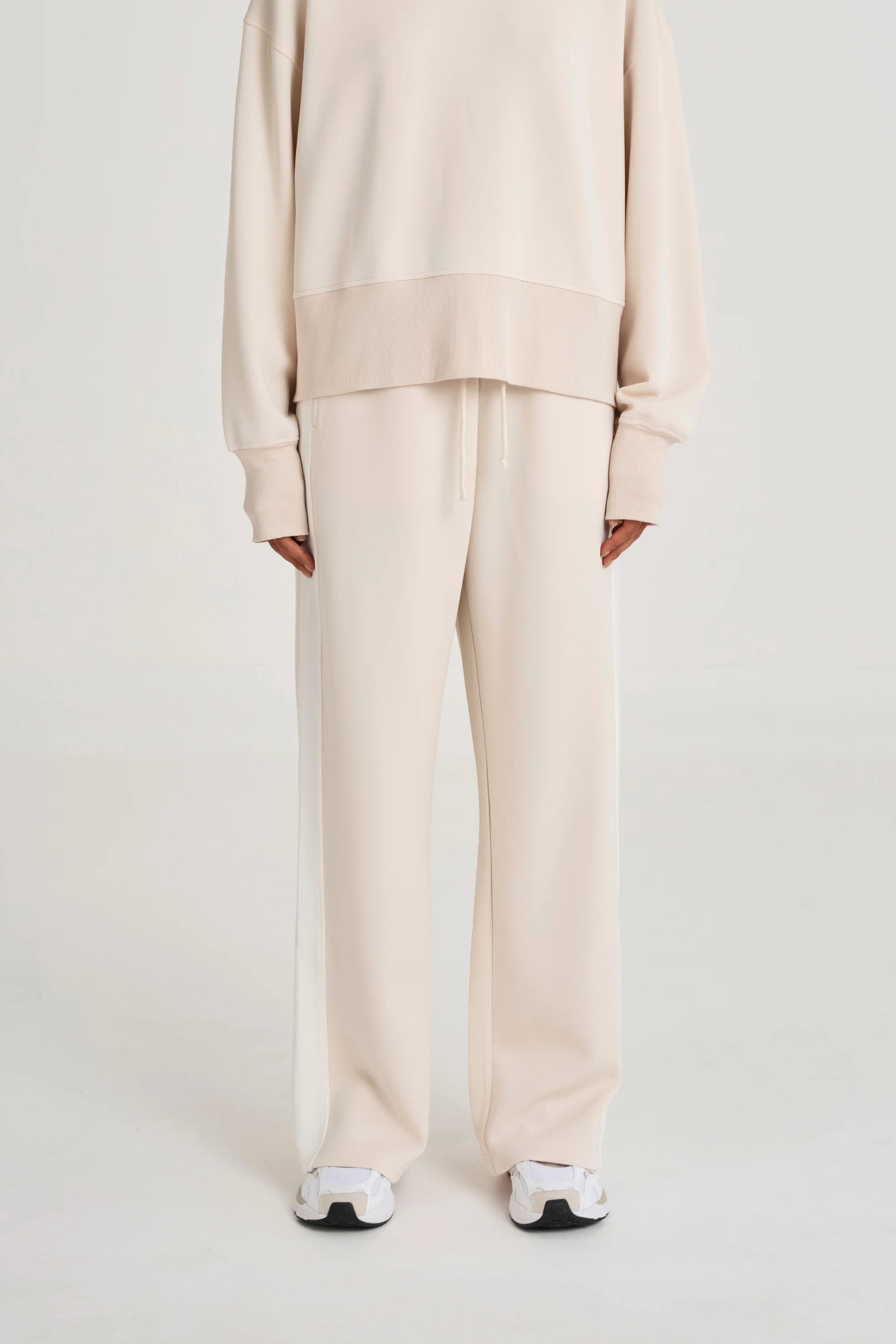 A4P257-STN_SoftLuxuryContrastWideLegTrackPant_Stone_Shopify1.webp