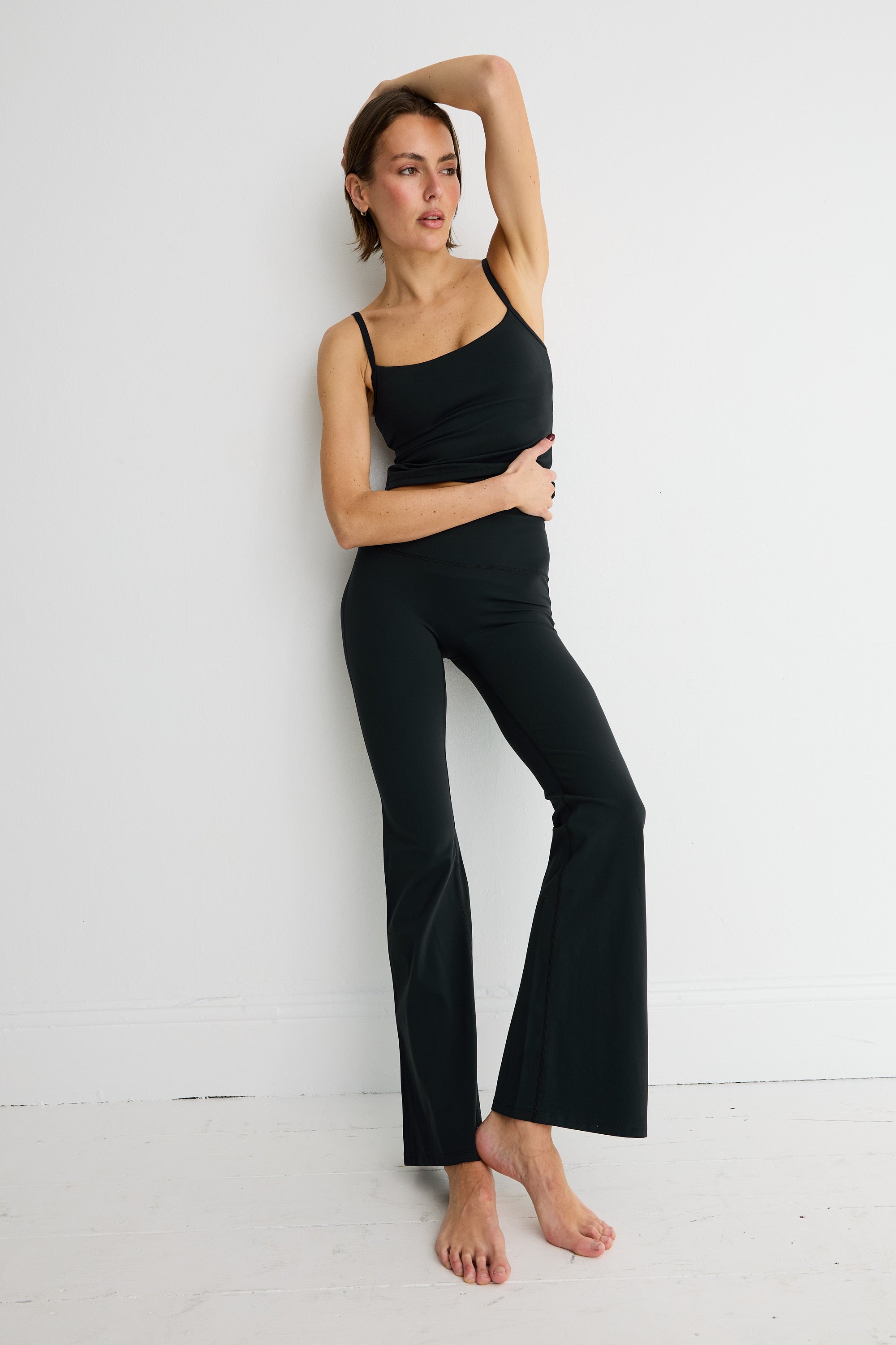 ALLFENIX CloudCore Flared Legging in Black — front view