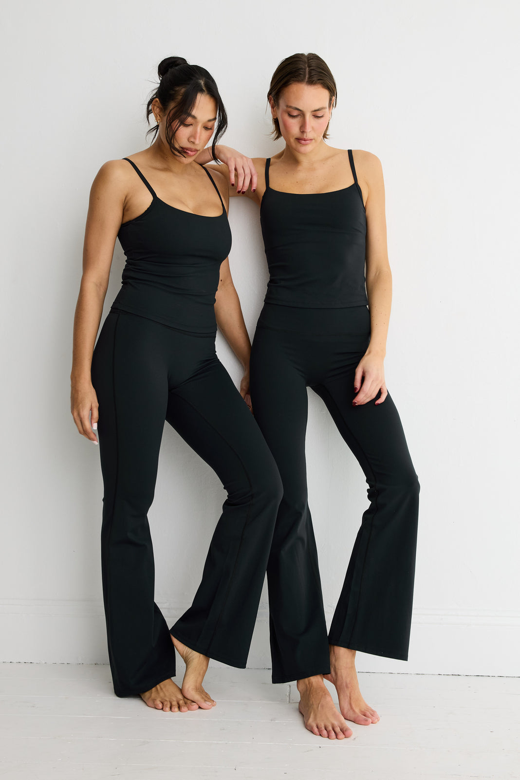 ALLFENIX CloudCore Flared Legging in Black — back view