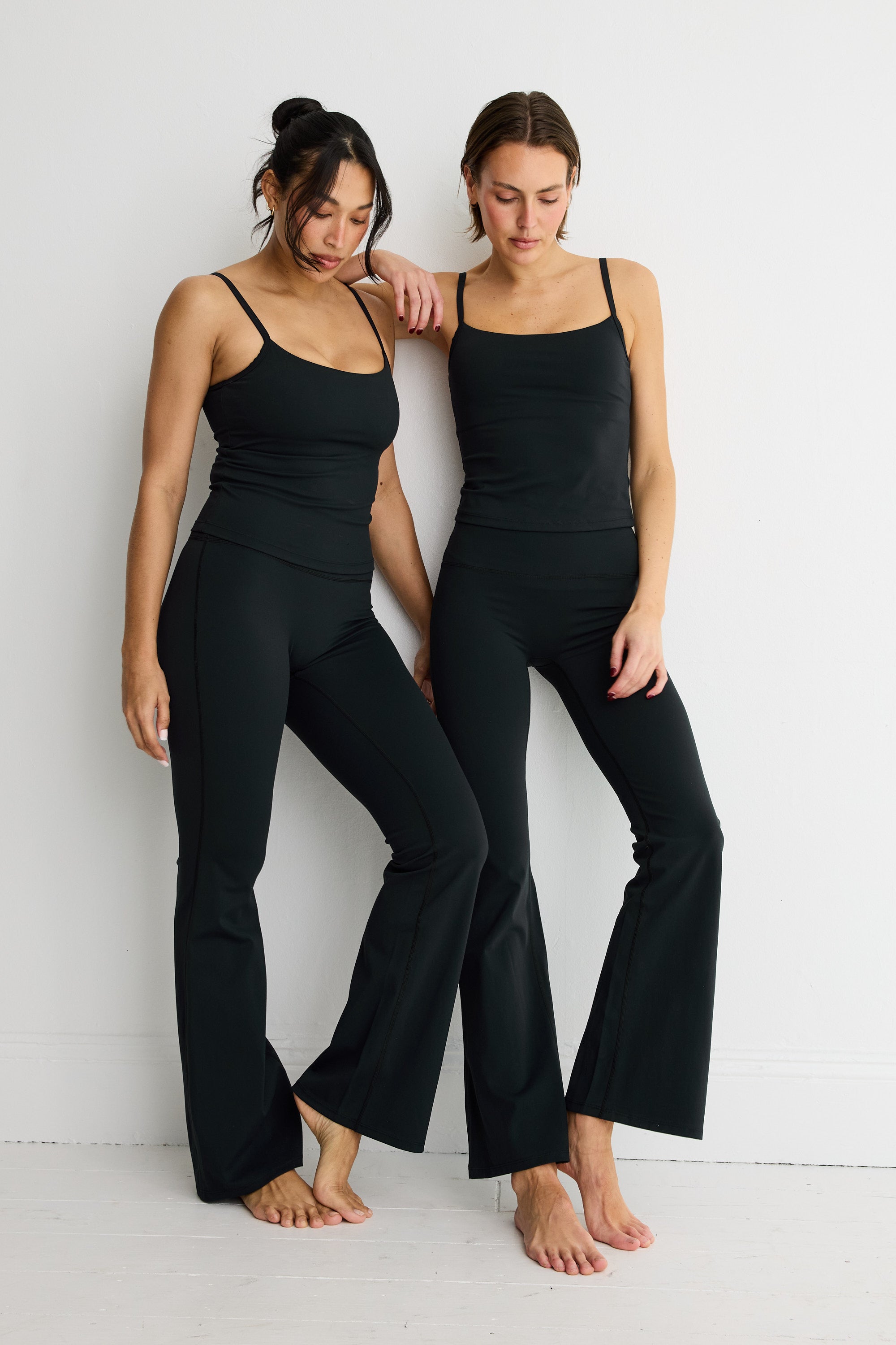 ALLFENIX CloudCore Flared Legging in Black — back view