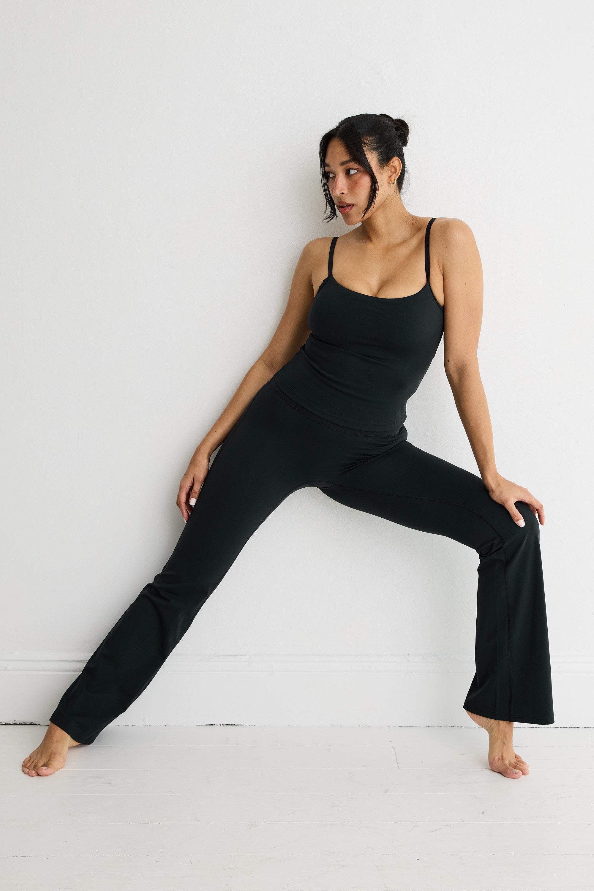 ALLFENIX CloudCore Flared Legging in Black — full length view