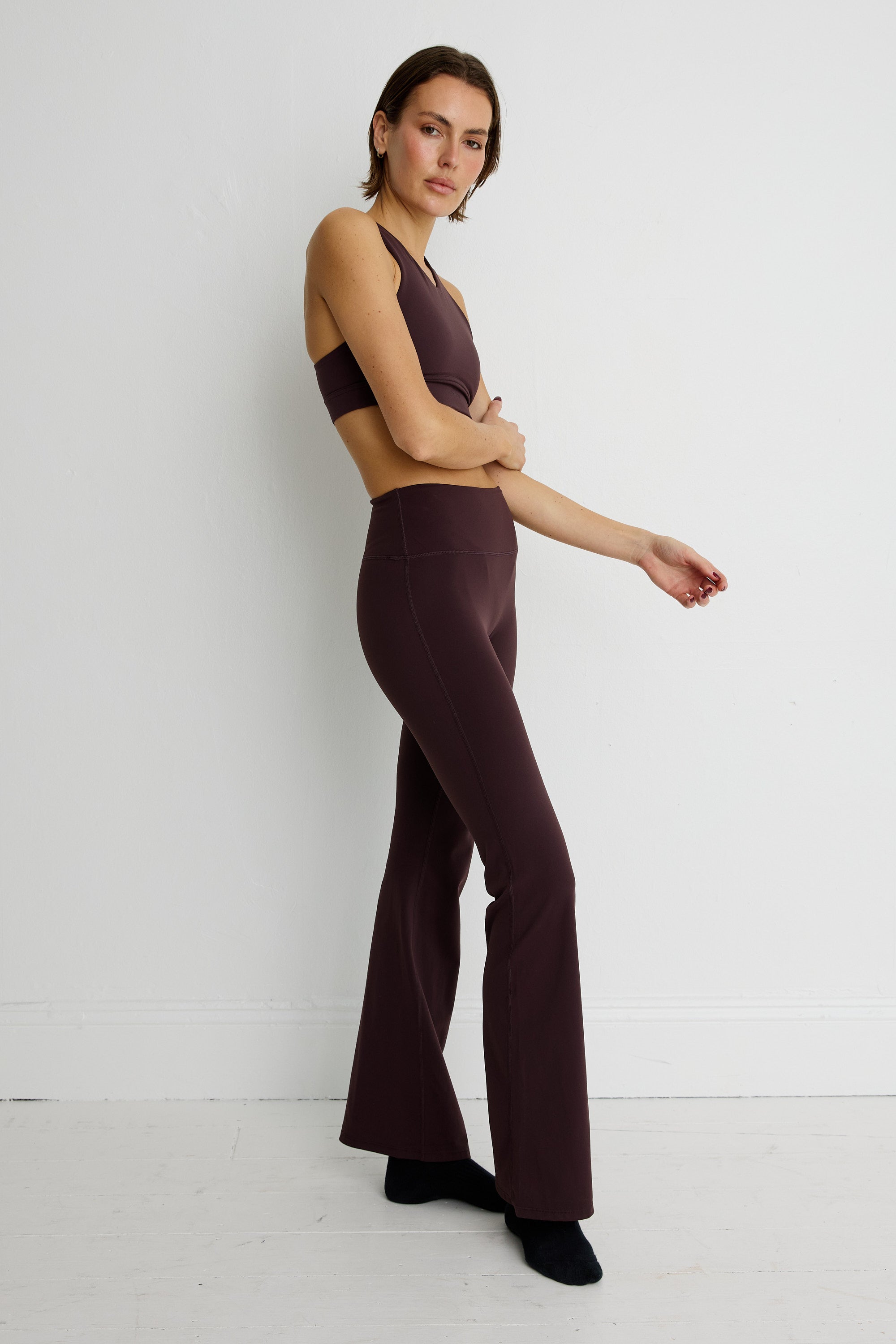 ALLFENIX CloudCore Flared Legging in Double Espresso — side view